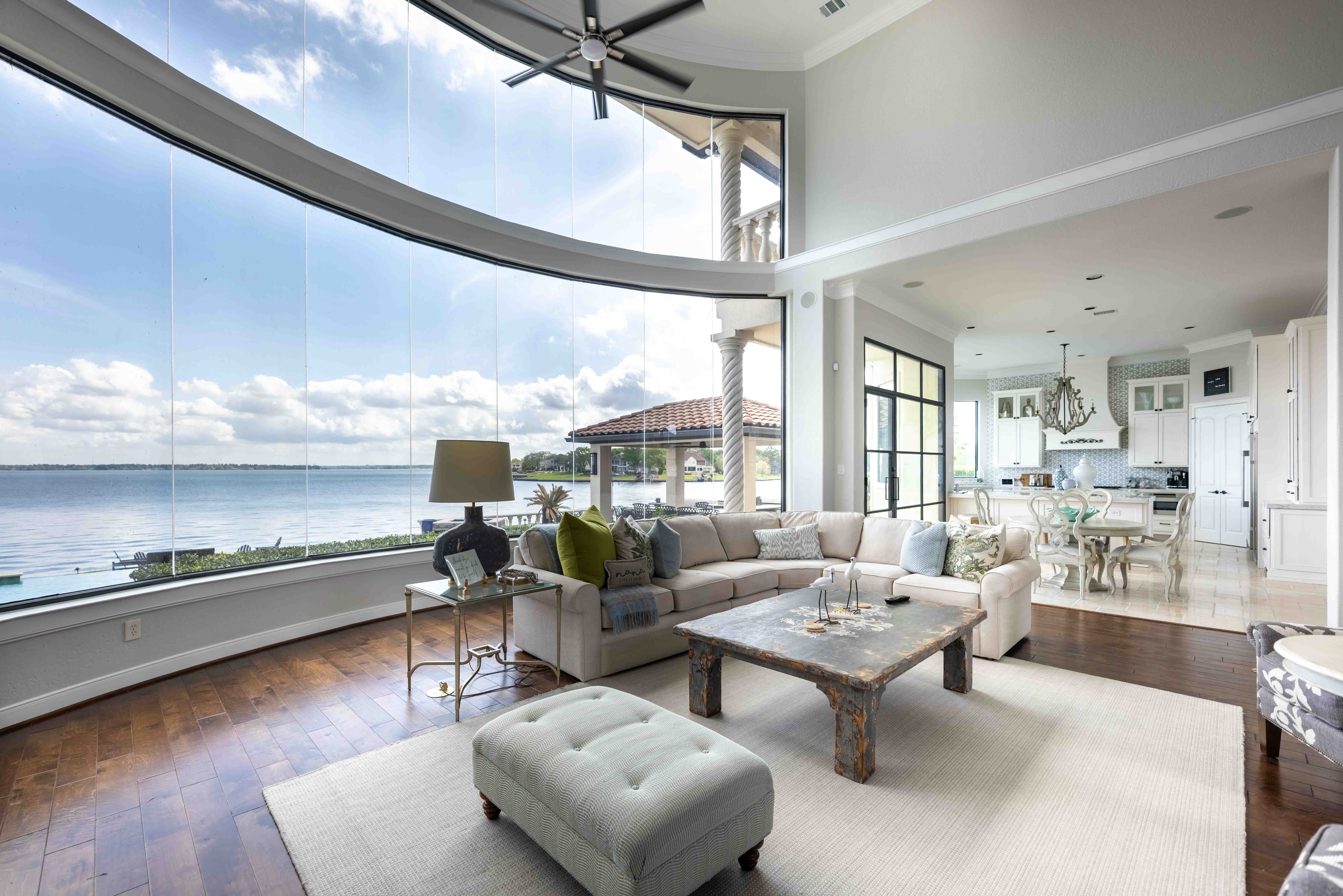 Living room with panoramic window views, Houston real estate photography