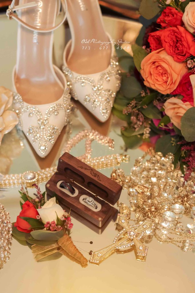 Wedding shoes and jewelry detail flat lay with roses