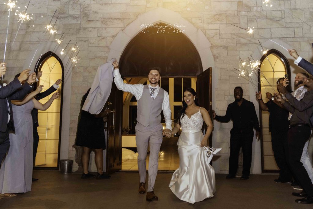 Wedding party celebrating outside church, Houston wedding photography