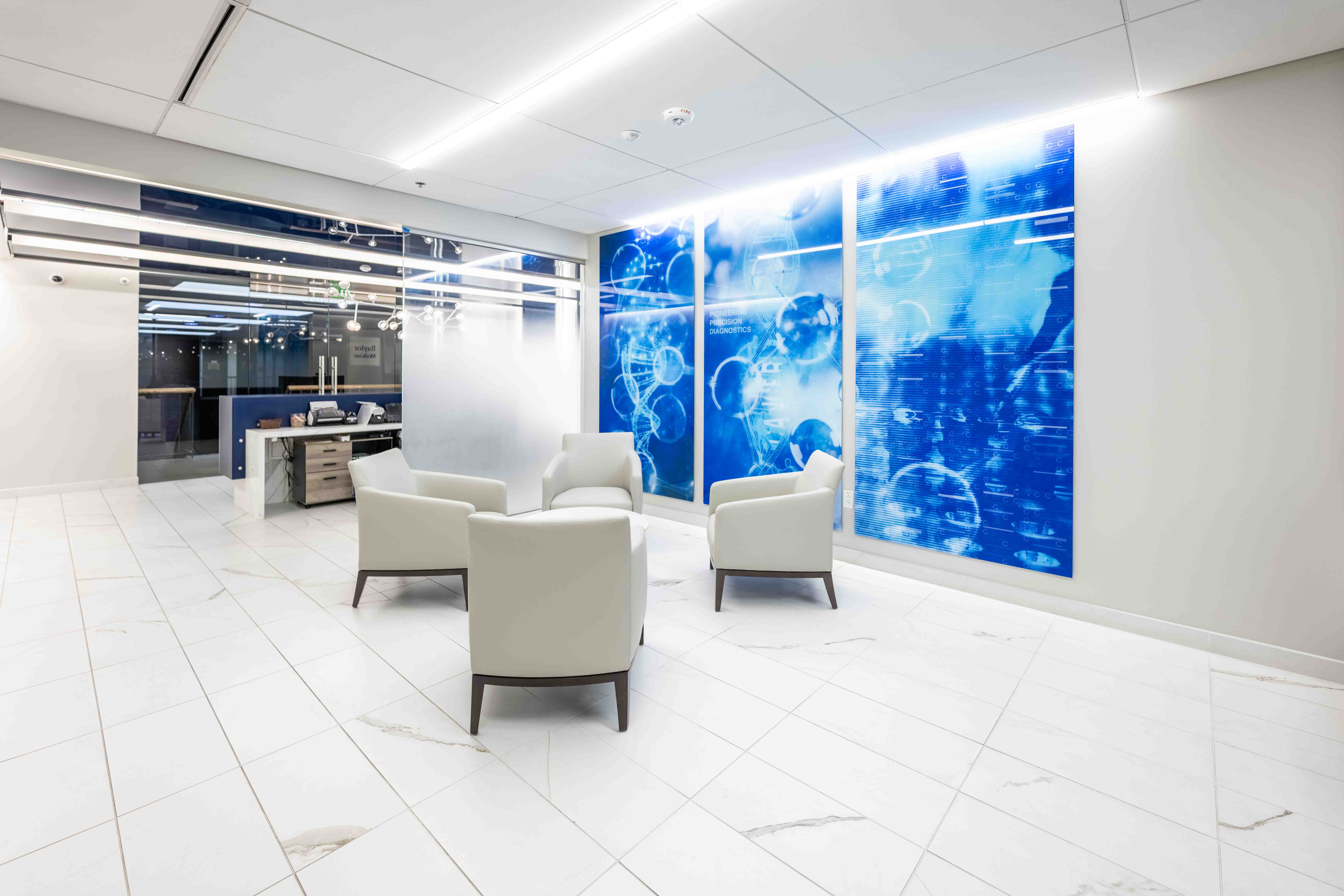 Modern medical office waiting room with blue wall art